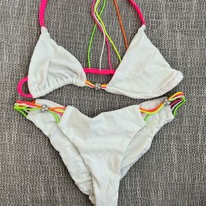 Sporty white Beachbunny suit. Perfect for neon parties or bachelorette!Worn once